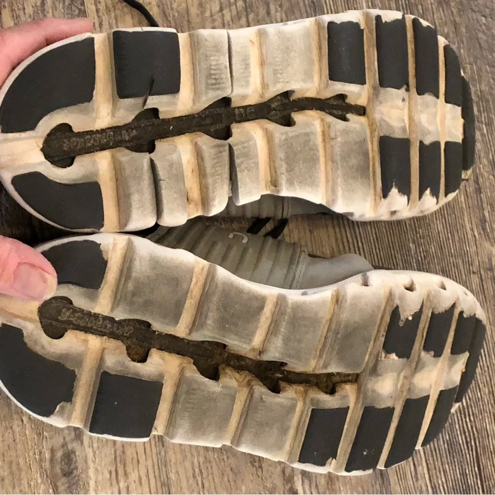 On cloud tennis shoes used condition.  Has some holes,pictures& slits on bottom